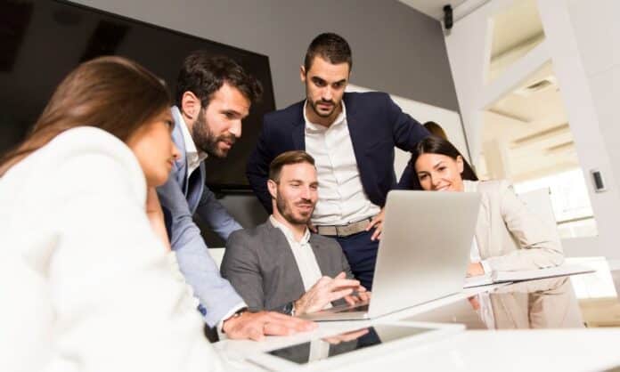 A digital project management dashboard displaying velocity charts and resource allocation for a tech team using hybrid project management strategies.